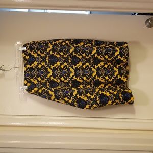 Skirt. Pencil. Quilted and lined. Yellow with black and blue paisley print.